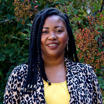 Marie Augustin standing outside