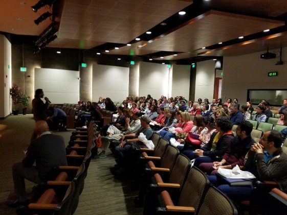 Auditorium presentation group photo