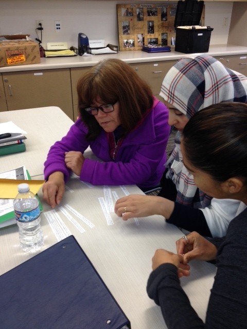 faculty and student working in health careers classroom