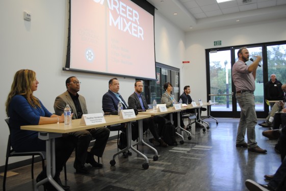 people talking at the career mixer