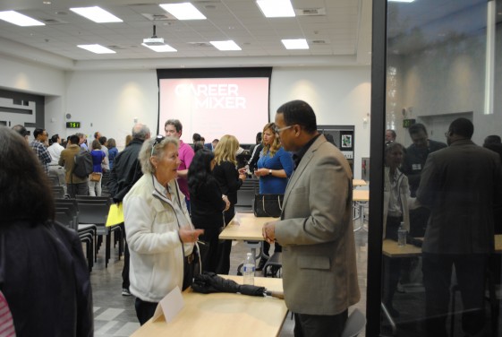 people talking at the career mixer