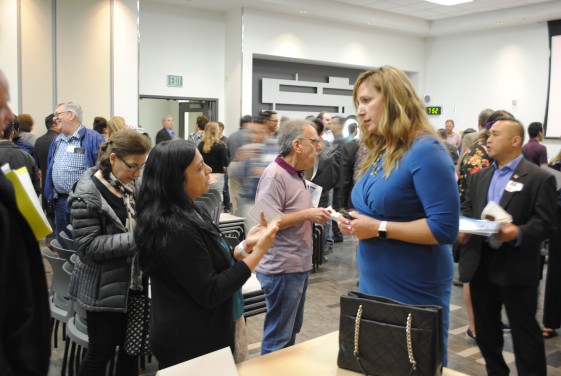people talking at the career mixer