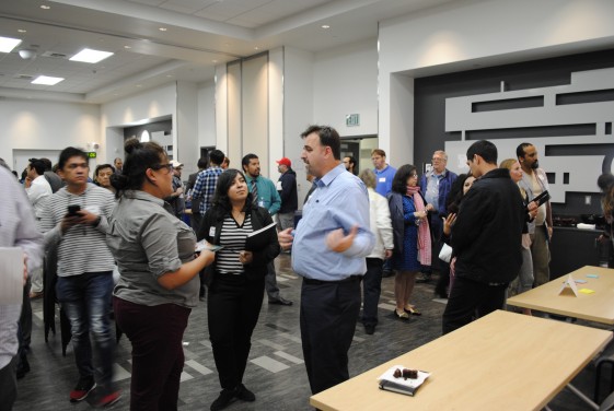 people talking at the career mixer