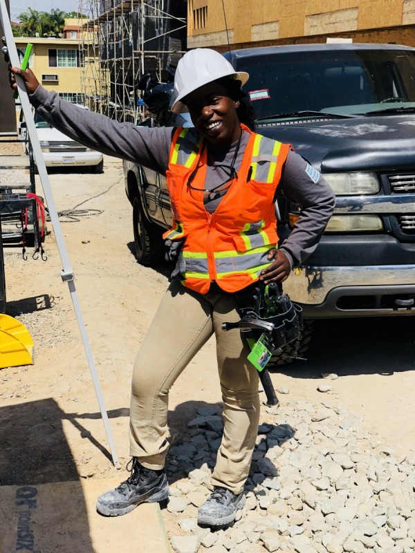 SDCE Student Lakenya Rose Foster Installs Decks on the Third Floor of Construction Site