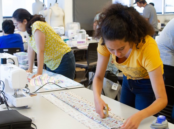 Students at San Diego Continuing Education make pillowcases for local foster youth