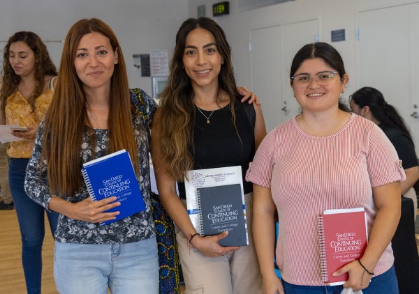 Prospective students learn about free career training programs during Enroll Fest at San Diego College of Continuing Education